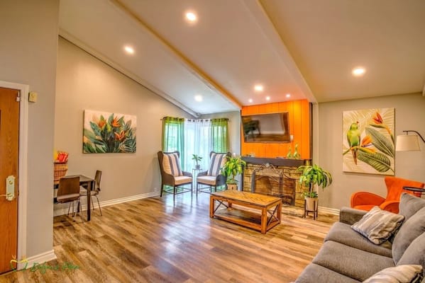 Cozy living room with plants and comfortable seating