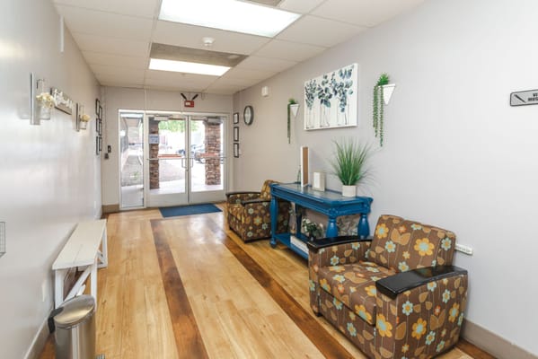 Bright hallway with seating and decorations