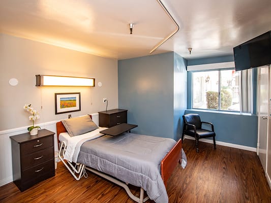 Private resident room with bed and window