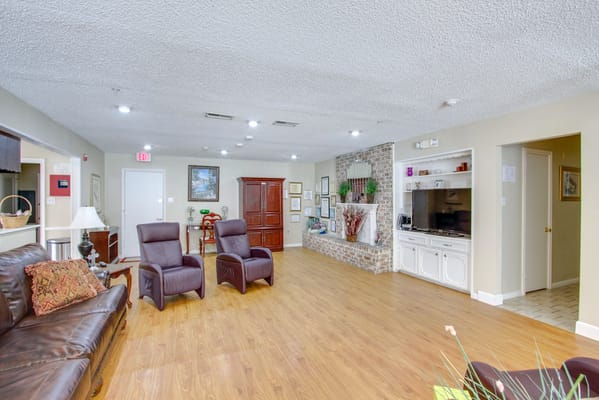 Cozy living room with comfortable seating and decorative wall art