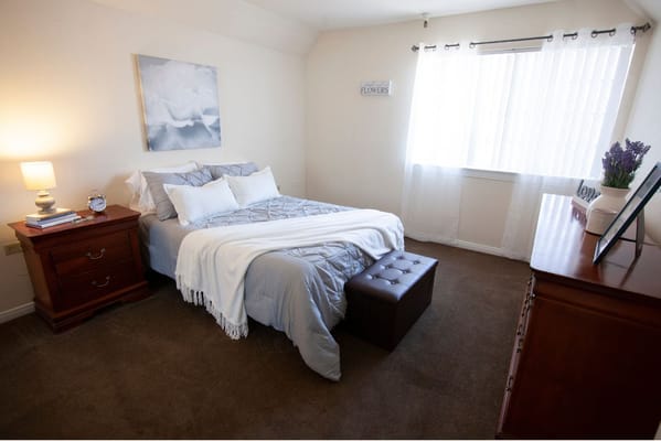 Cozy bedroom with a comfortable bed and decor