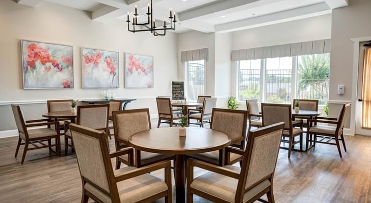 Bright dining room with wooden tables and chairs