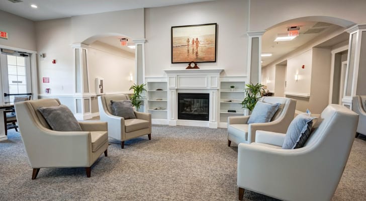Common area with seating and decorative art