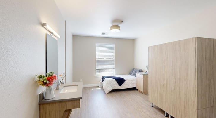 Bright, spacious resident room with modern furnishings