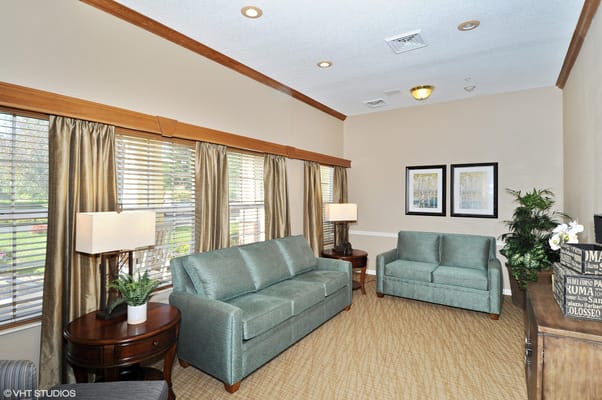 Cozy common area with couches and lamps