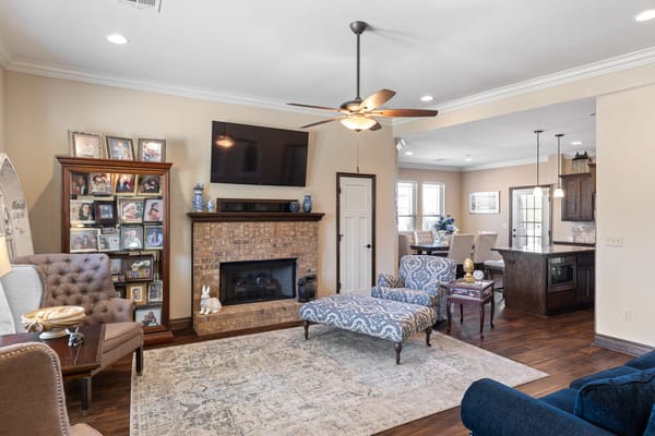 Living room with comfortable seating and a fireplace