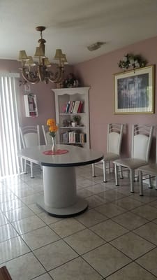 Interior dining area with a round table and chairs
