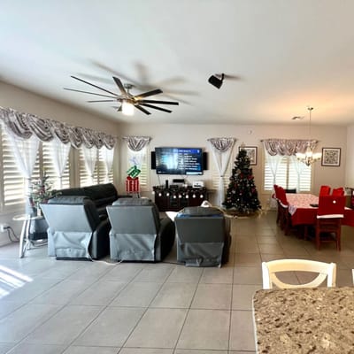 Bright common area with festive decor and seating