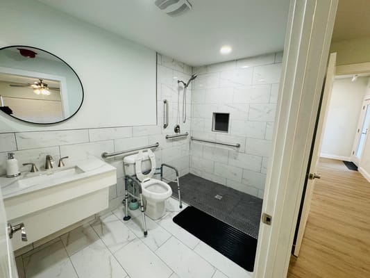 Accessible bathroom with modern fixtures and lighting