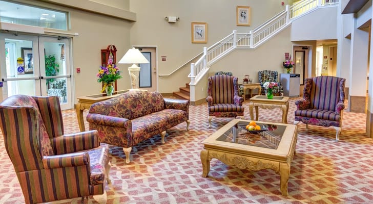 Bright and welcoming common area with seating and decor