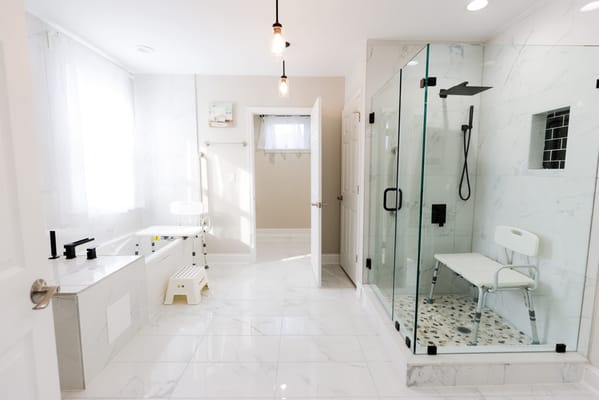Bright and accessible bathroom with a shower and tub