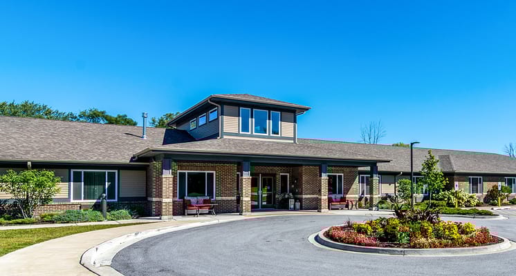 Front entrance view of Porter Place with landscaped garden