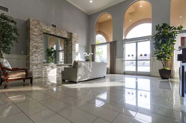 Interior view of a well-lit common area with stylish seating