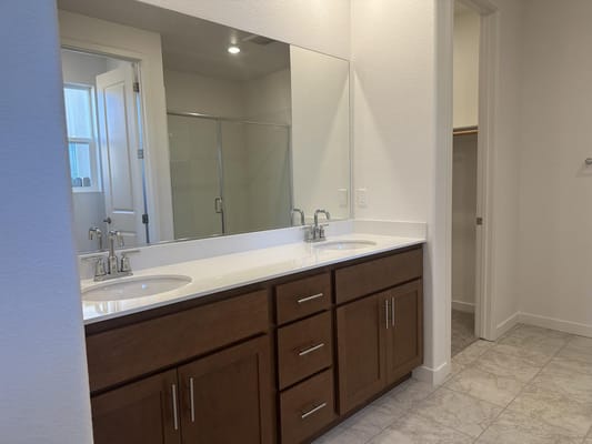 Modern bathroom with double sink and large mirror