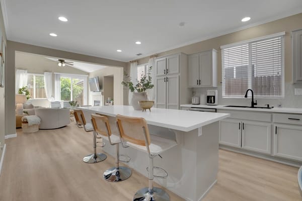 Bright and airy kitchen with a large island and seating