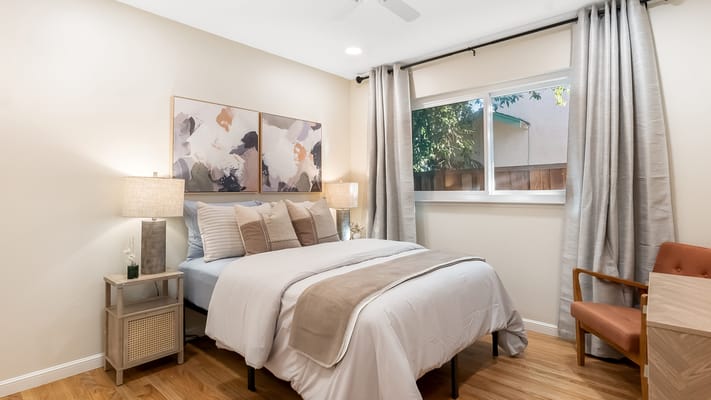 Cozy bedroom with natural light and decor
