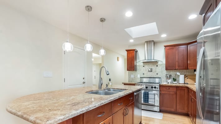 Modern kitchen with wooden cabinets and appliances