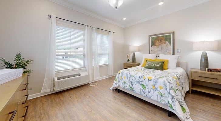 Welcoming bedroom with floral bedding and natural light