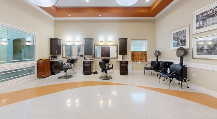 Interior view of the salon with styling chairs and mirrors.