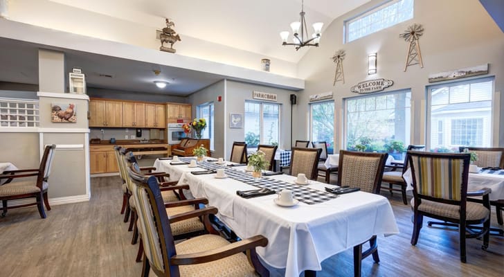 Bright dining area with tables set for a meal