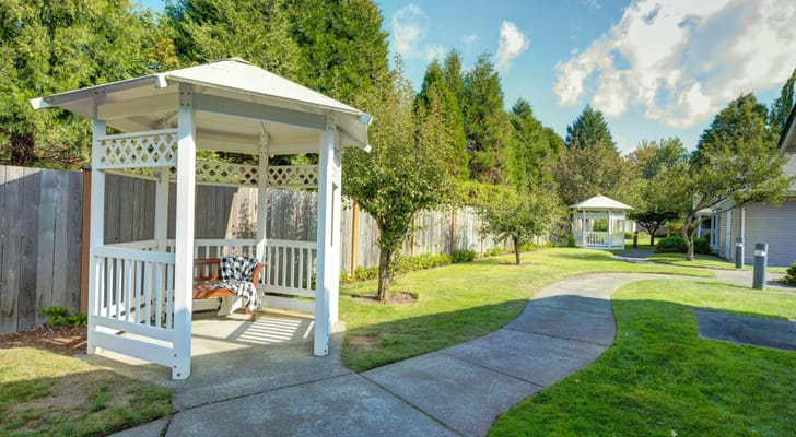 A beautiful gazebo in a landscaped garden area