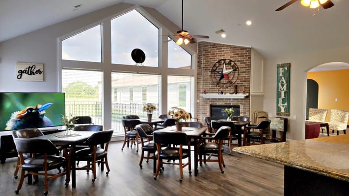 Bright common area with seating and decor