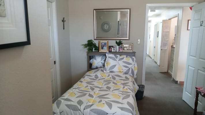 Cozy private resident room with photos and decor