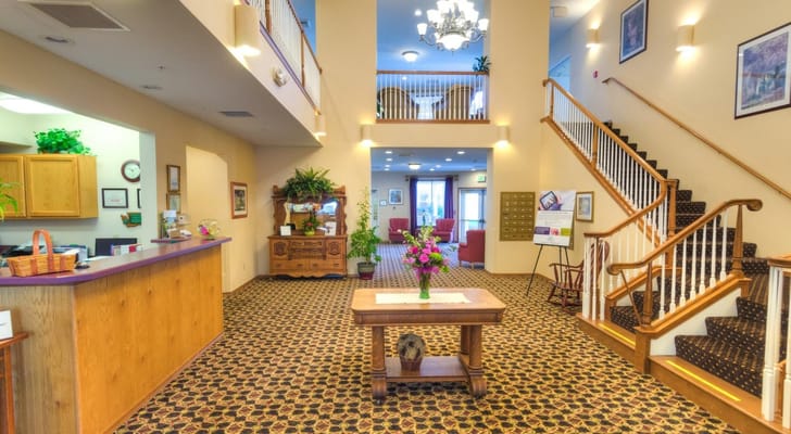 Interior view of a welcoming common area with a reception desk