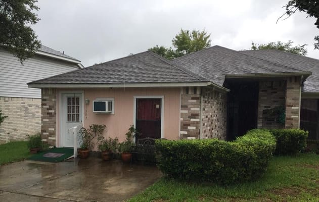 Exterior view of a residential building with garden
