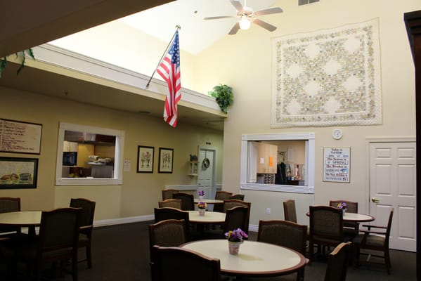 Interior view of a dining area with tables and decor