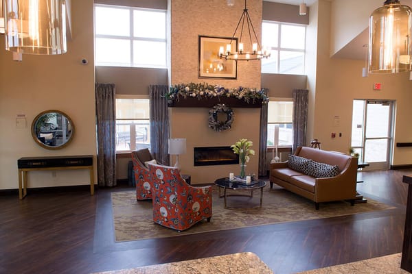 Bright and inviting common area with cozy furniture