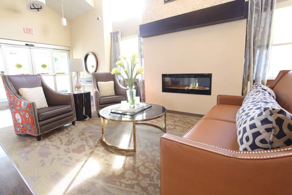 Interior common area with seating and fireplace