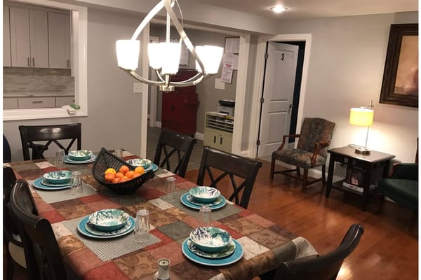 Dining area with a decorated table for residents