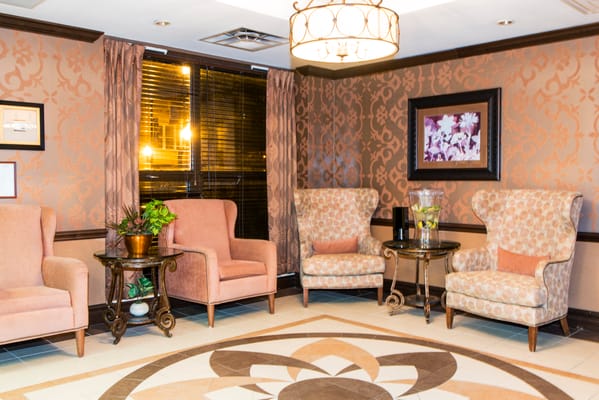 Cozy lounge area with comfortable chairs and decor