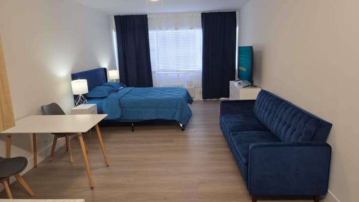 Cozy interior of a resident room with a blue theme