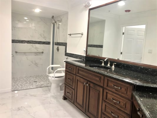 Restroom with accessible features and modern fixtures