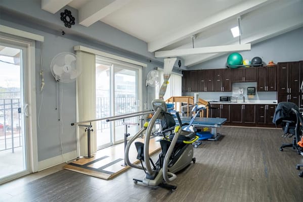Interior view of a therapy room with equipment