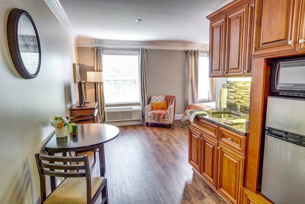 Cozy interior of a resident room with kitchen area