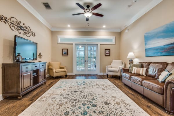 Bright living room with a comfortable sofa and TV