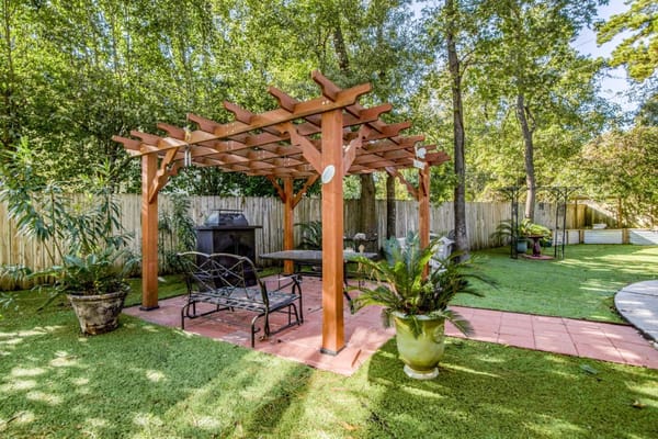 Outdoor seating area with gazebo and garden