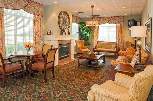 Cozy common area with seating and fireplace