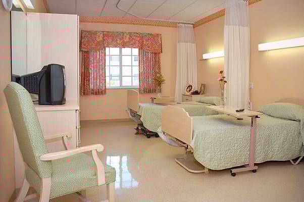 Interior view of a shared resident room with two beds
