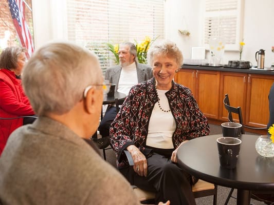 Residents chatting in a common area