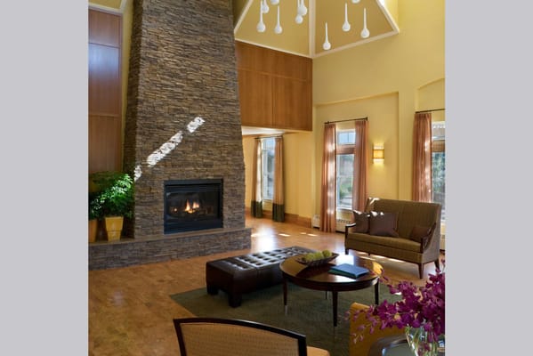 Cozy common area with a fireplace and seating