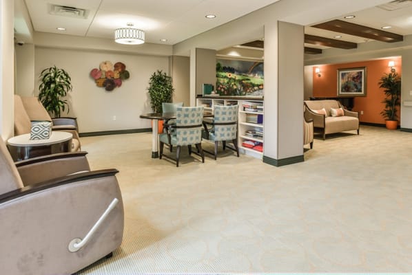Interior of a common area with seating and art