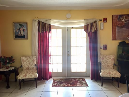 Welcoming lobby area with seating and natural light