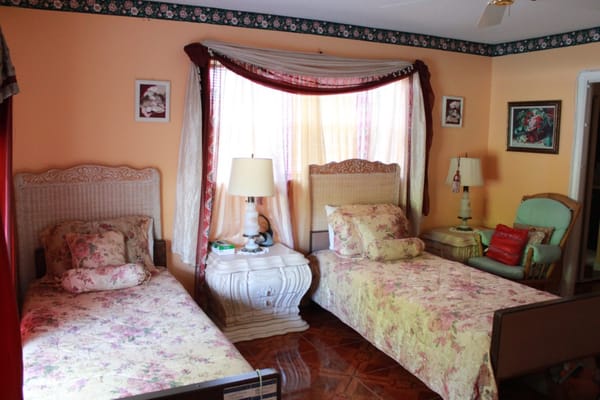 Cozy private bedroom with floral decor