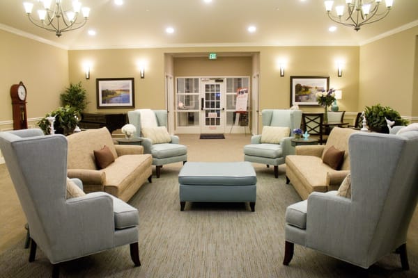 Cozy living room seating area with armchairs and a coffee table