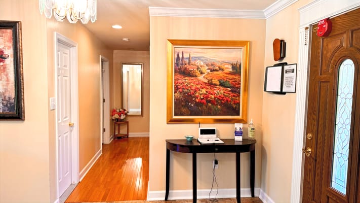 Welcoming entrance hall with artwork and decor