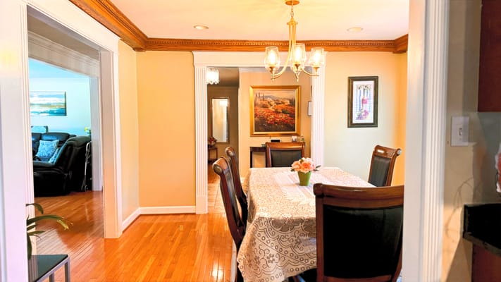 Dining area with a table and chairs in a welcoming setting